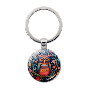 Artistic abstract owl keychain featuring a colorful bohemian glass cabochon and silver ring
