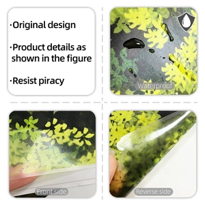 Close-up of waterproof wall sticker with yellow floral pattern and peel-off backing