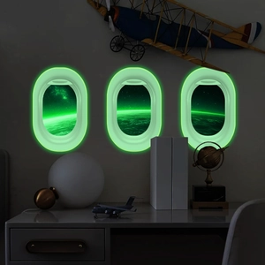 Luminous airplane window wall stickers featuring glowing astronaut and planet galaxy scenery