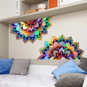 Detail of laser iridescent mandala wall sticker with gradient colors on a bedroom wall