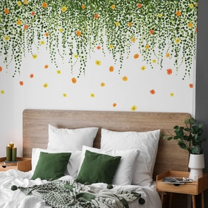 Green vine and floral wall decals for cozy bedroom decoration above headboard