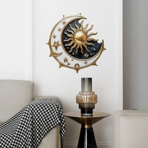 Golden sun and moon celestial wall art with blue galaxy inlay for home decor