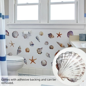 Detailed view of self-adhesive marine sea star and shell wall stickers on tile