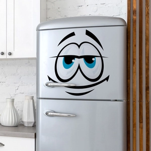 Creative funny cartoon smiling face stickers on a silver double-door refrigerator