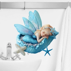 Detail of blue fairy wall sticker inside shell with pearls for bathroom decor