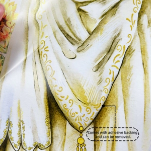 Close-up of vintage sunflower wall sticker showing adhesive backing and removable film