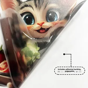 Detail of self-adhesive cartoon cat wall sticker showing the peel-off removable backing