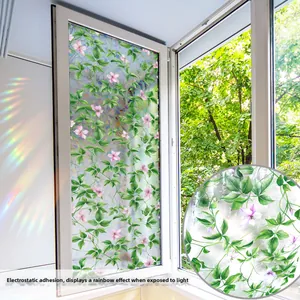 Detail of static cling window film with pink flowers and rainbow light effects