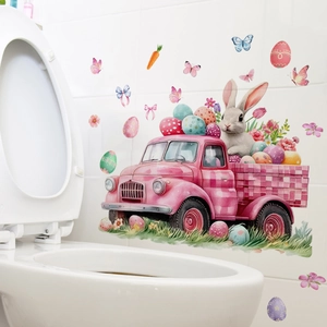 Close-up of Easter wall stickers with cute bunnies and colorful eggs on white bathroom tiles