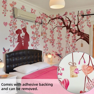 Detail of heart tree wall decal showing adhesive backing for easy application and removal