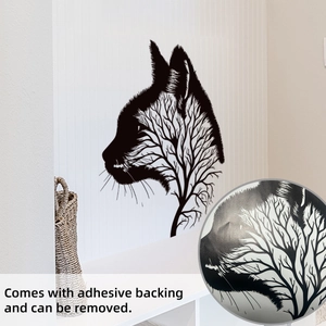 Detail of matte black cat silhouette wall sticker with branch pattern and adhesive backing