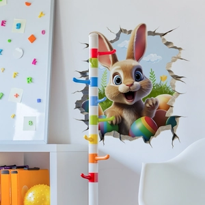 3D Easter bunny wall sticker featuring colorful eggs through a realistic wall crack