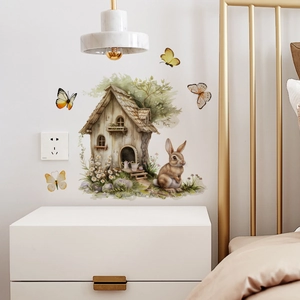 Detailed wall sticker set featuring a watercolor bunny, wooden house, and floral garden