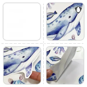 Detail of waterproof marine life wall stickers showing watercolor whales and adhesive backing