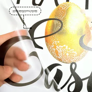 Detail of self-adhesive Easter toilet sticker being peeled off showing easy removal