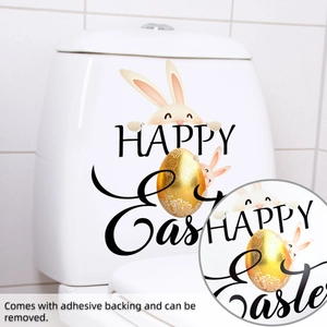 Detailed view of Easter bunny and golden egg decal applied on a white toilet tank