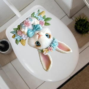 Close-up of Easter bunny toilet lid sticker with blue bow and floral decorations