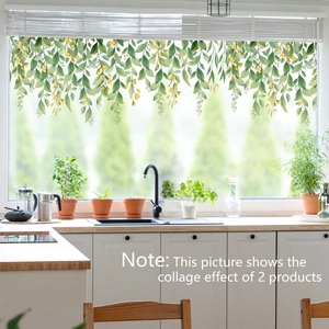 Detail of green vine window stickers with yellow flowers in a modern kitchen setting
