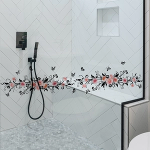 Pink roses and black vine wall stickers with butterflies on white bathroom tiles