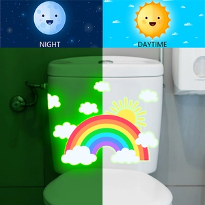 Luminous rainbow and cloud toilet stickers with glowing green night and colorful day effect