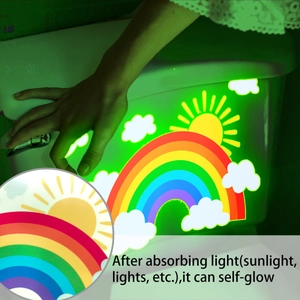 Luminous rainbow and cloud stickers glowing green in the dark for bathroom decoration