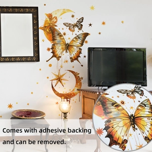 Detail view of gold moon, butterfly and star wall decals with adhesive backing in a living room