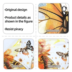 Detailed view of waterproof orange butterfly and star wall stickers with double-sided design