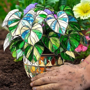 Creative hand-painted PVC heart-shaped plant stake with colorful mosaic style pot