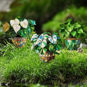Three creative stained glass style heart-shaped plant stakes for garden decoration