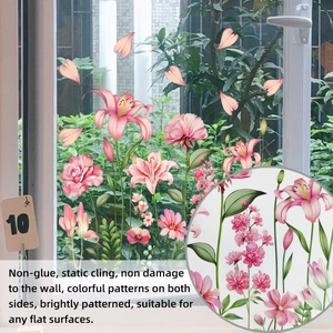 Close-up of double-sided floral static window cling with pink lily and rose patterns