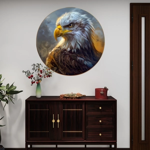 Majestic eagle wall art print in gold frame on white wall above wooden cabinet