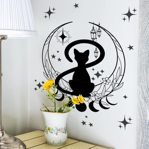 Detailed wall sticker view of black cat, moon, and floral decals on a white bedroom wall