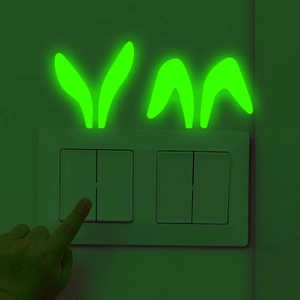 Luminous bunny ear stickers for light switches in fluorescent green glow for kids rooms