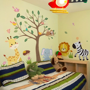 Cartoon forest animals wall decal with giraffe, elephant and lion for nursery decor