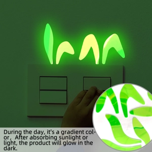 Luminous bunny ear wall stickers showing green glow in the dark around light switch