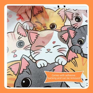 Detail showing self-adhesive backing and easy removal of cartoon cat wall stickers