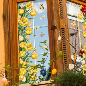 Spring yellow tulip flowers and butterfly double-sided window stickers on wooden glass