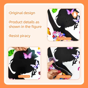 Macro detail of waterproof dancing girl wall sticker showing adhesive reverse and front side