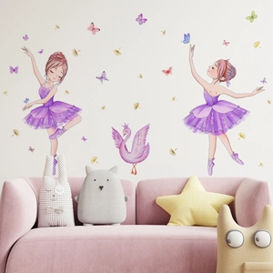 Detailed view of watercolor ballerina girl and swan wall stickers in a cozy nursery room