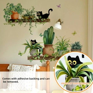 Detailed view of hand-painted cat and green plant wall stickers for home decoration
