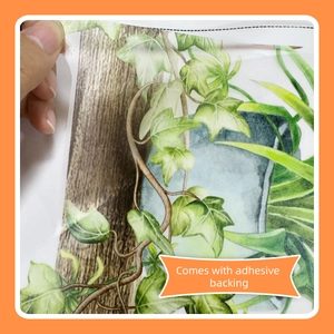 Adhesive wall sticker with green plants and wood grain pattern shown with peel-off backing