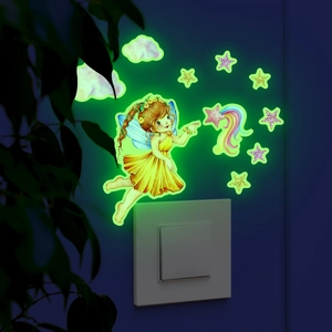 Glow-in-the-dark wall stickers with a fairy holding a star and clouds near a light switch