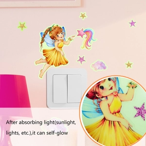 Glow in the dark wall sticker showing a fairy and stars on light switch decoration