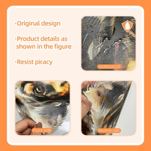 Detailed views of waterproof PVC dog stickers with original design and adhesive backing