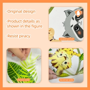 Detail view showing waterproof double-sided print of cartoon raccoon and tiger wall stickers