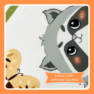 Detail of waterproof adhesive backing on cartoon raccoon and butterfly wall stickers