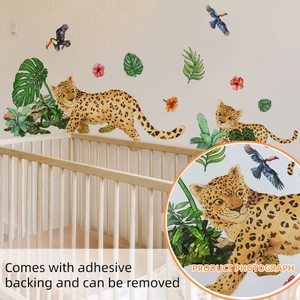 Detailed jungle wall decal with watercolor leopards and tropical leaves in nursery