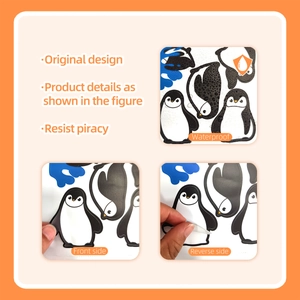 Waterproof cartoon penguin wall sticker detail showing adhesive back and water resistance