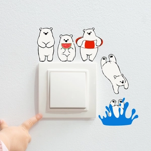 Cartoon polar bear wall stickers for light switches featuring cute diving bear designs