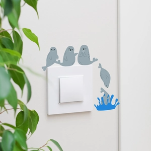 Detailed view of grey cartoon seal wall stickers for light switch decoration
